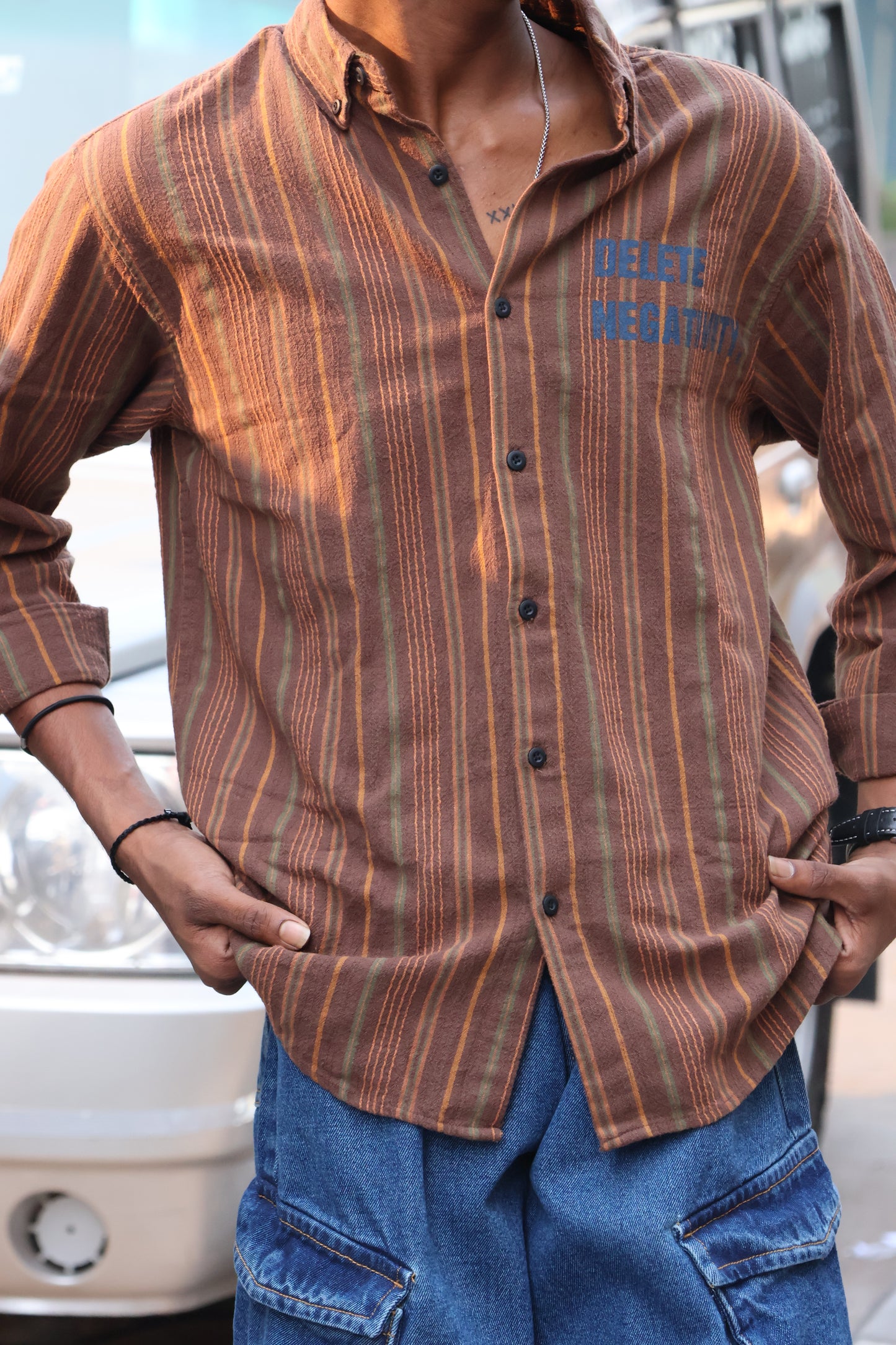 Delete Negativity" Textured Vertical Stripe Button-Down shirt